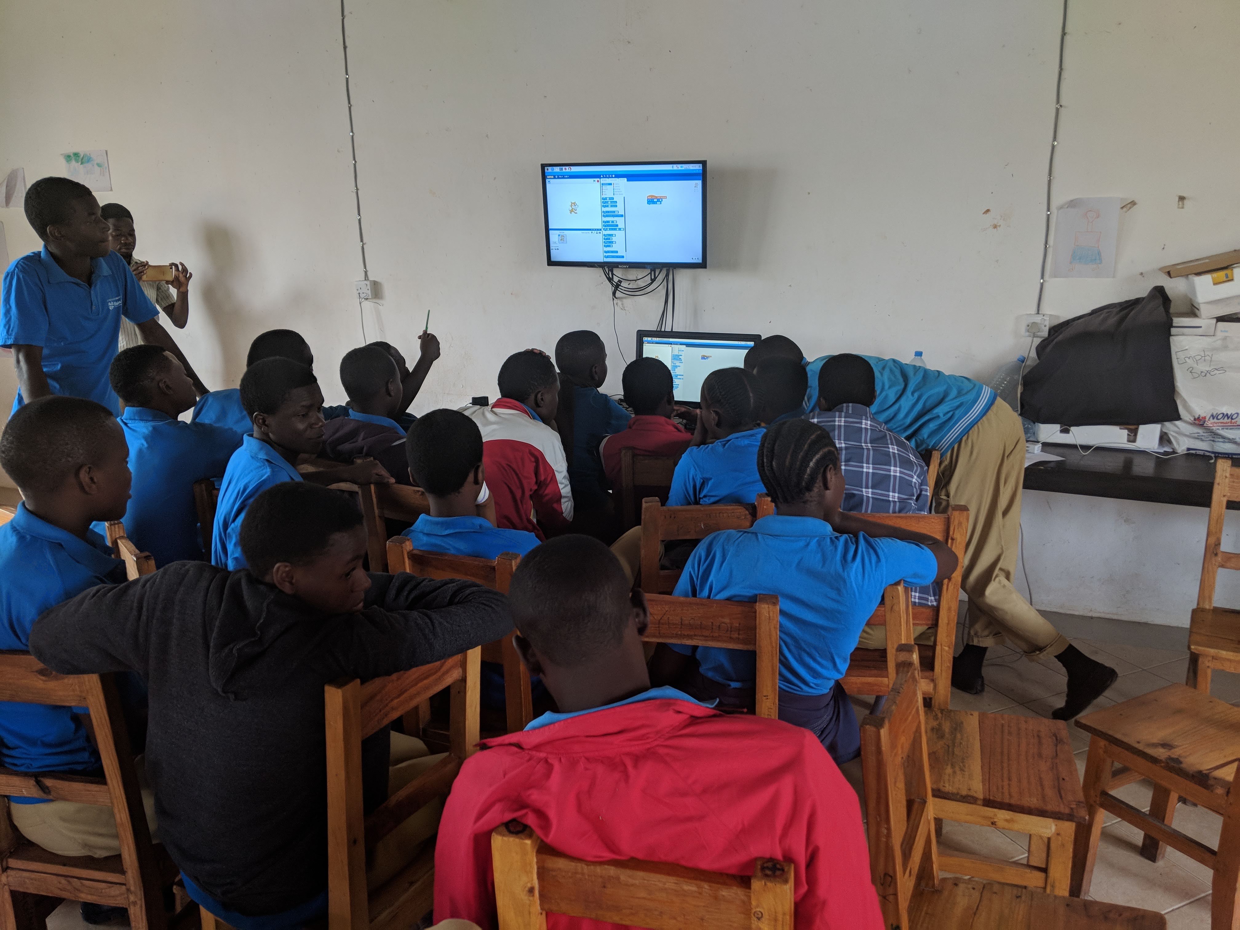 Teaching Scratch coding to high school students in Tanzania